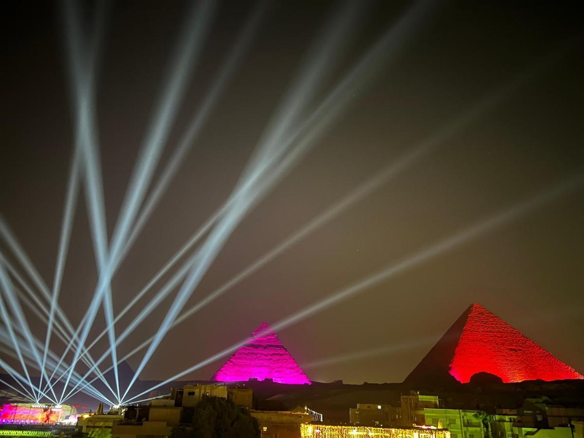 Grand Pyramids Inn Kafret el-Gabal Esterno foto