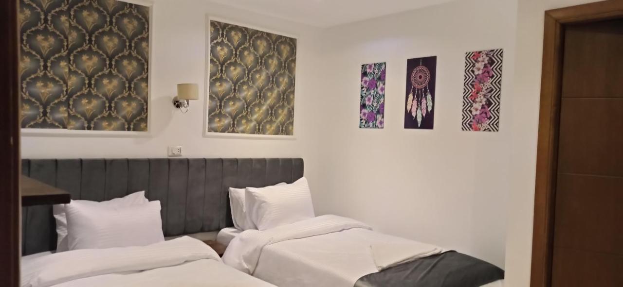 Grand Pyramids Inn Kafret el-Gabal Esterno foto