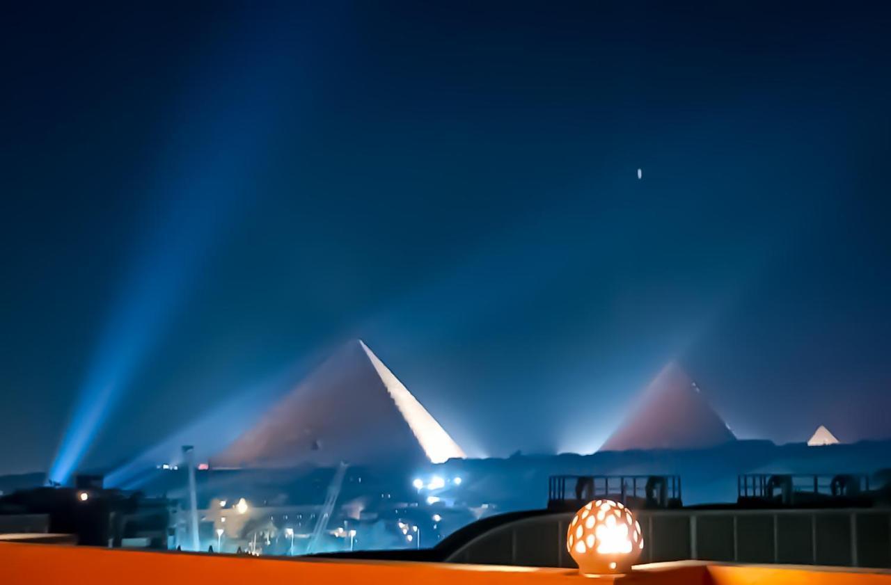 Grand Pyramids Inn Kafret el-Gabal Esterno foto