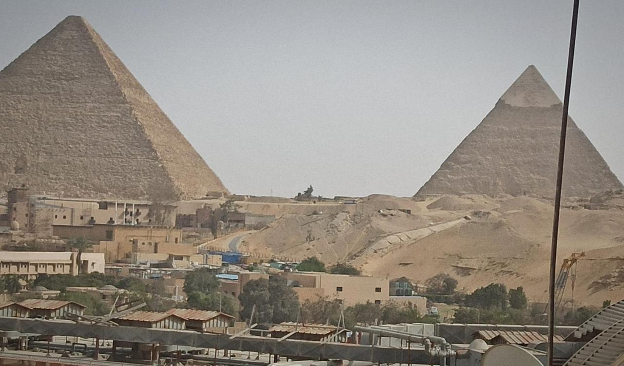 Grand Pyramids Inn Kafret el-Gabal Esterno foto