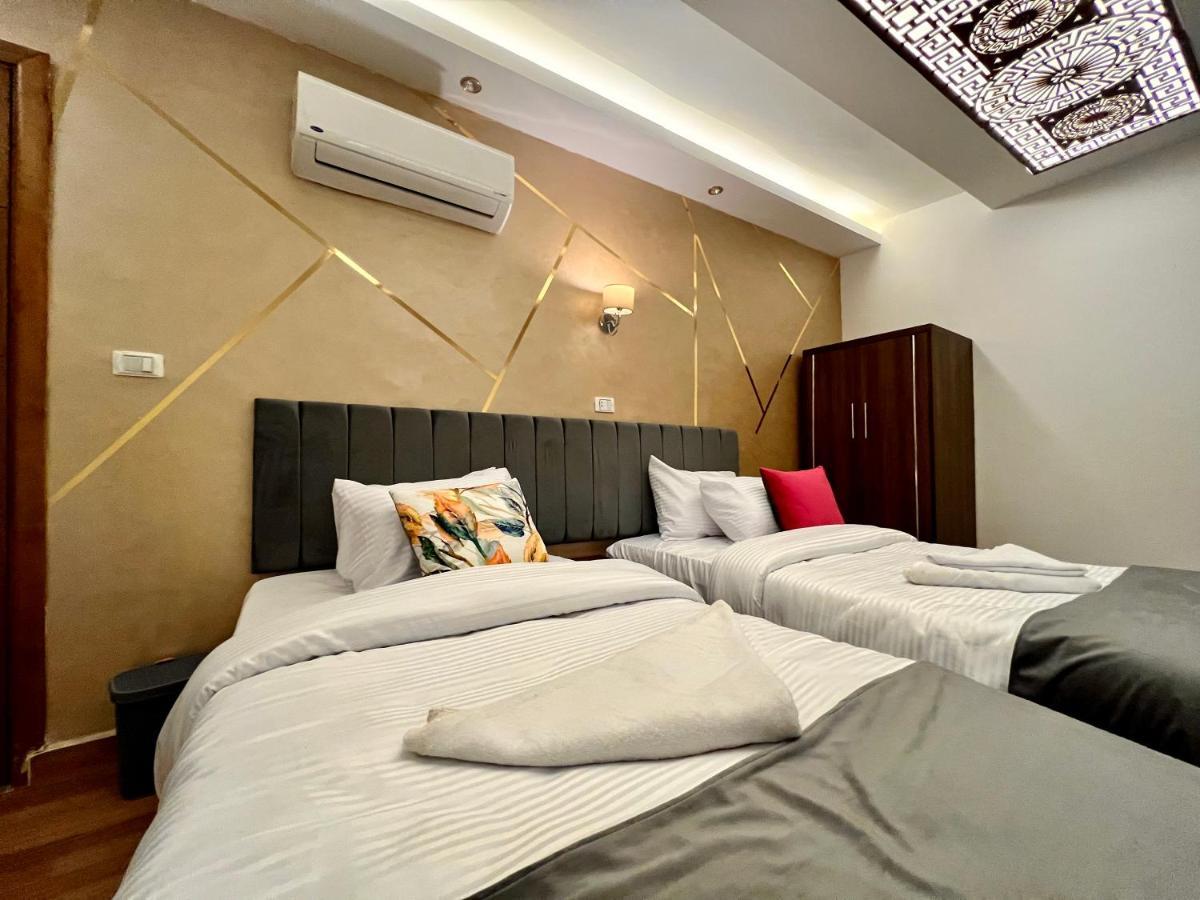 Grand Pyramids Inn Kafret el-Gabal Esterno foto