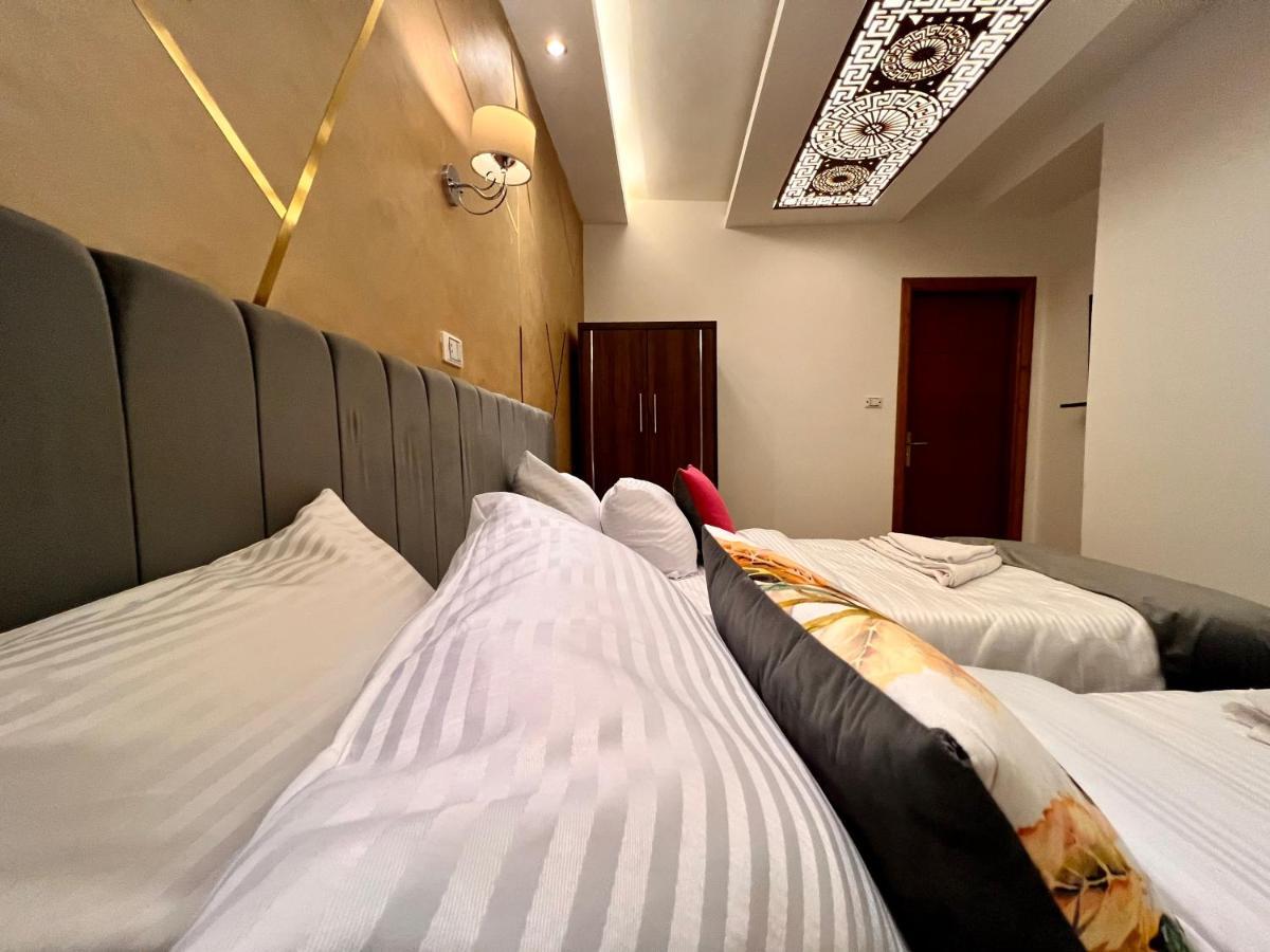 Grand Pyramids Inn Kafret el-Gabal Esterno foto