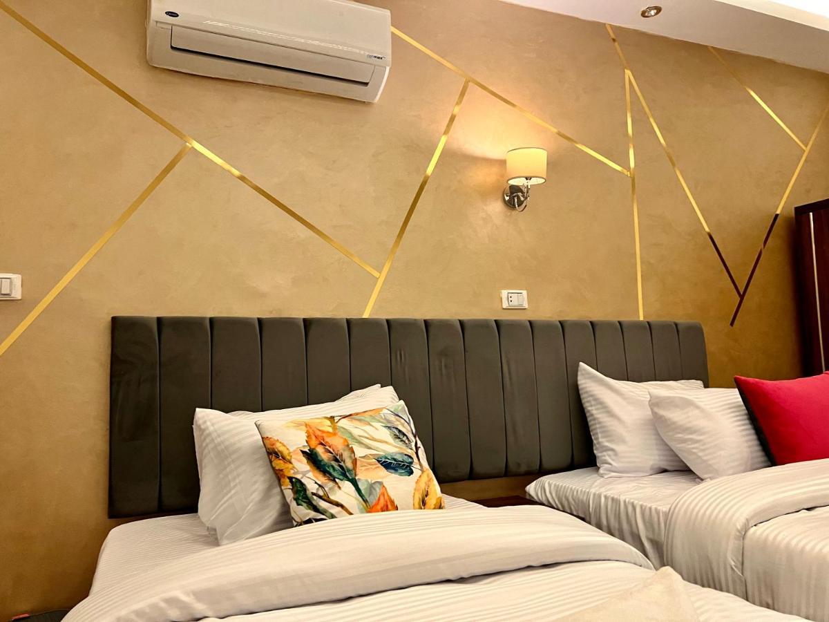 Grand Pyramids Inn Kafret el-Gabal Esterno foto