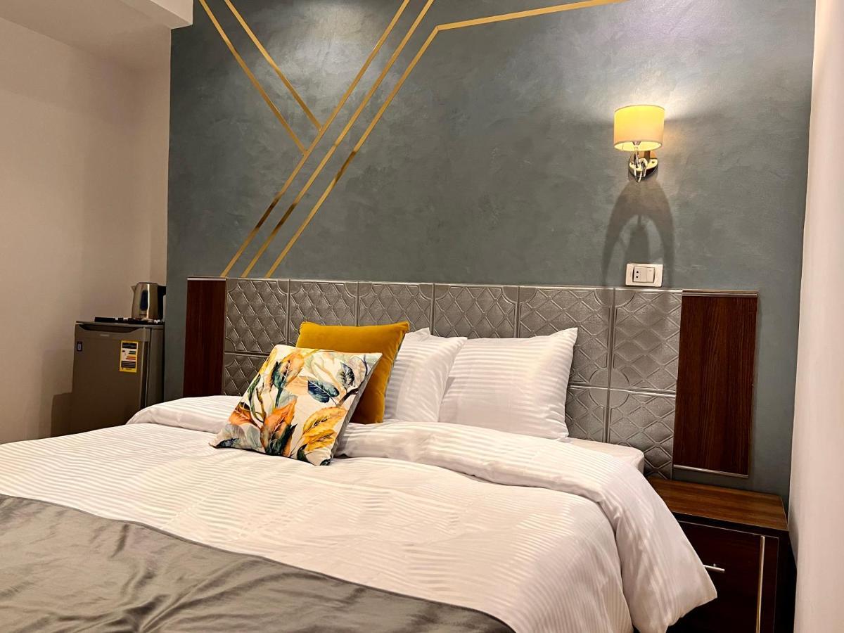 Grand Pyramids Inn Kafret el-Gabal Esterno foto
