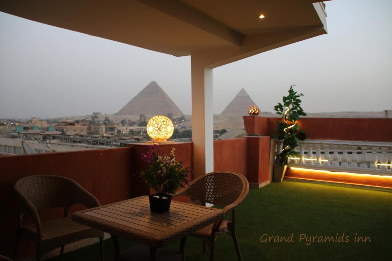 Grand Pyramids Inn Kafret el-Gabal Esterno foto