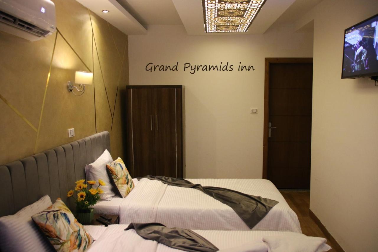 Grand Pyramids Inn Kafret el-Gabal Esterno foto