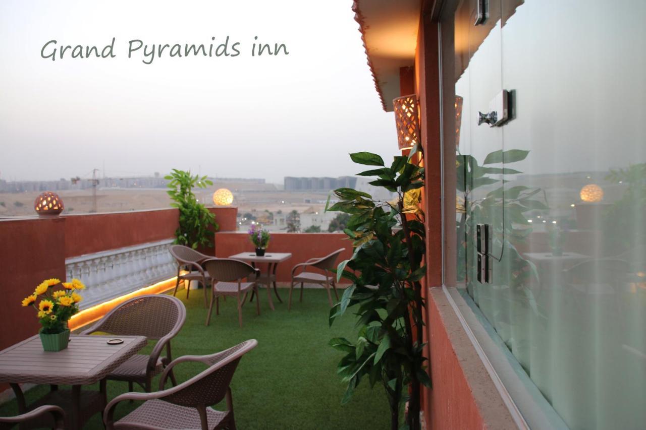 Grand Pyramids Inn Kafret el-Gabal Esterno foto