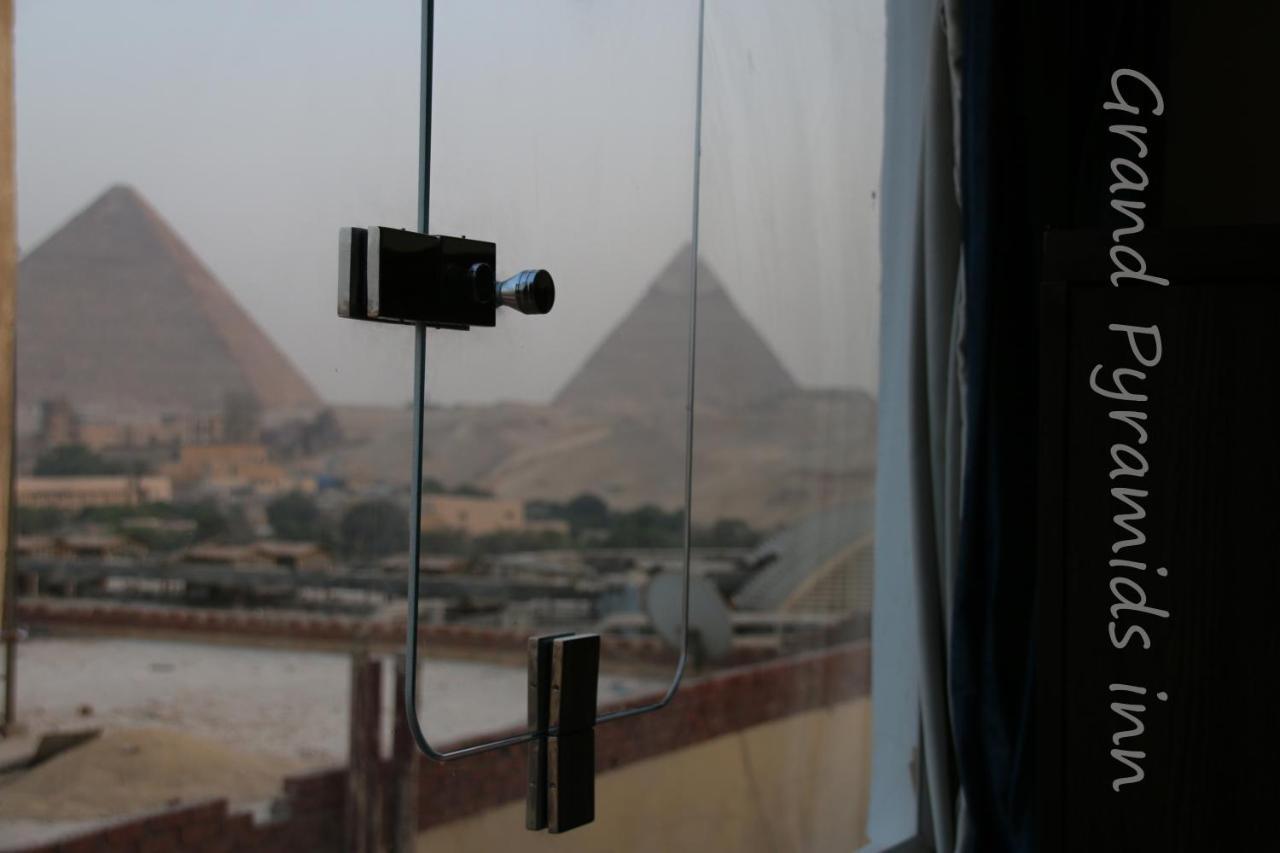 Grand Pyramids Inn Kafret el-Gabal Esterno foto