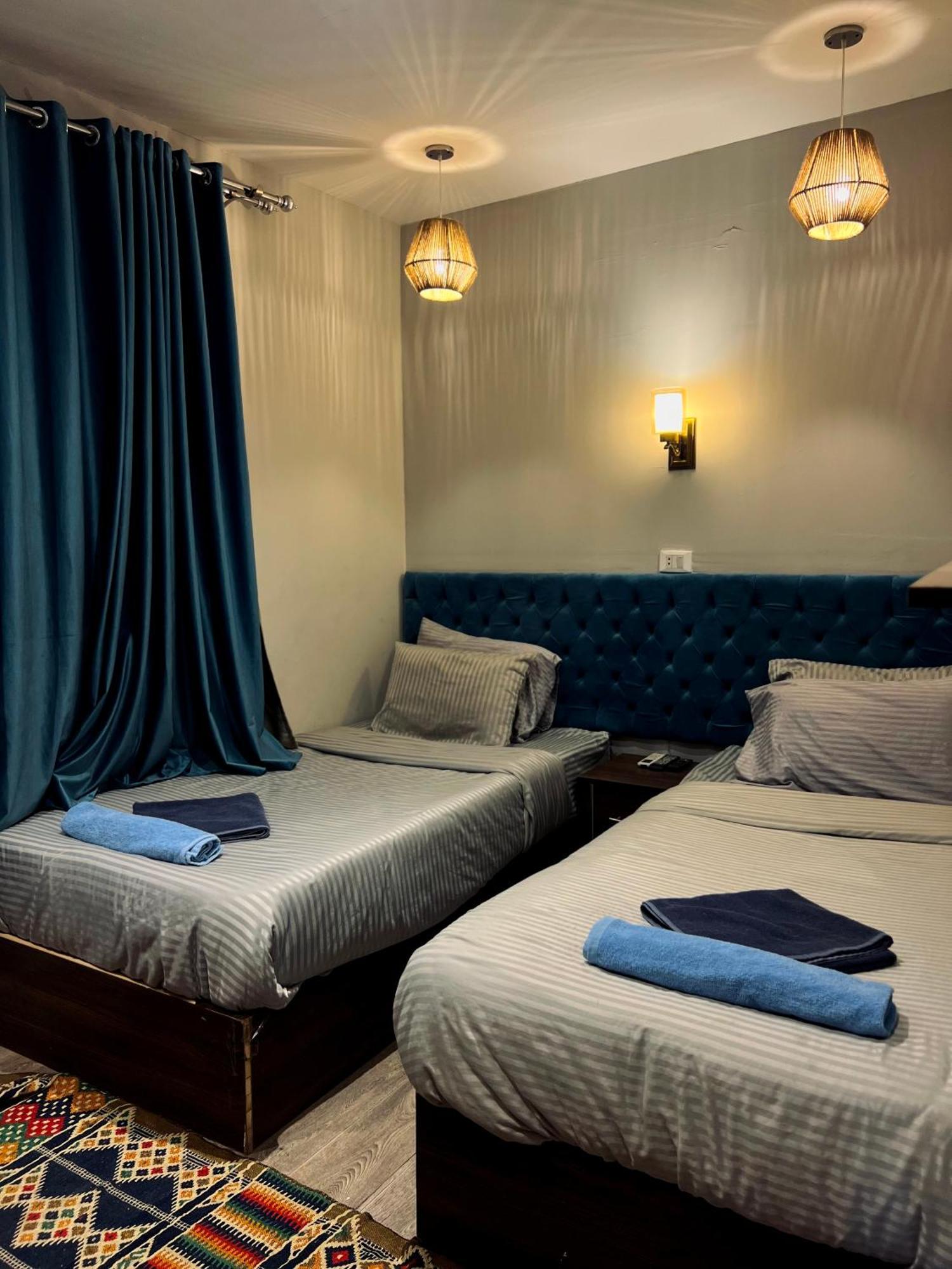 Grand Pyramids Inn Kafret el-Gabal Esterno foto