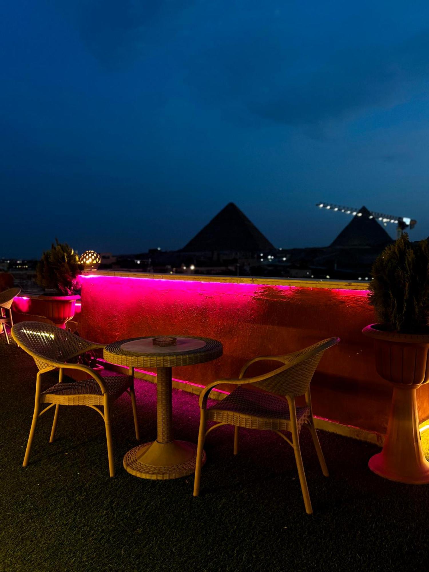 Grand Pyramids Inn Kafret el-Gabal Esterno foto
