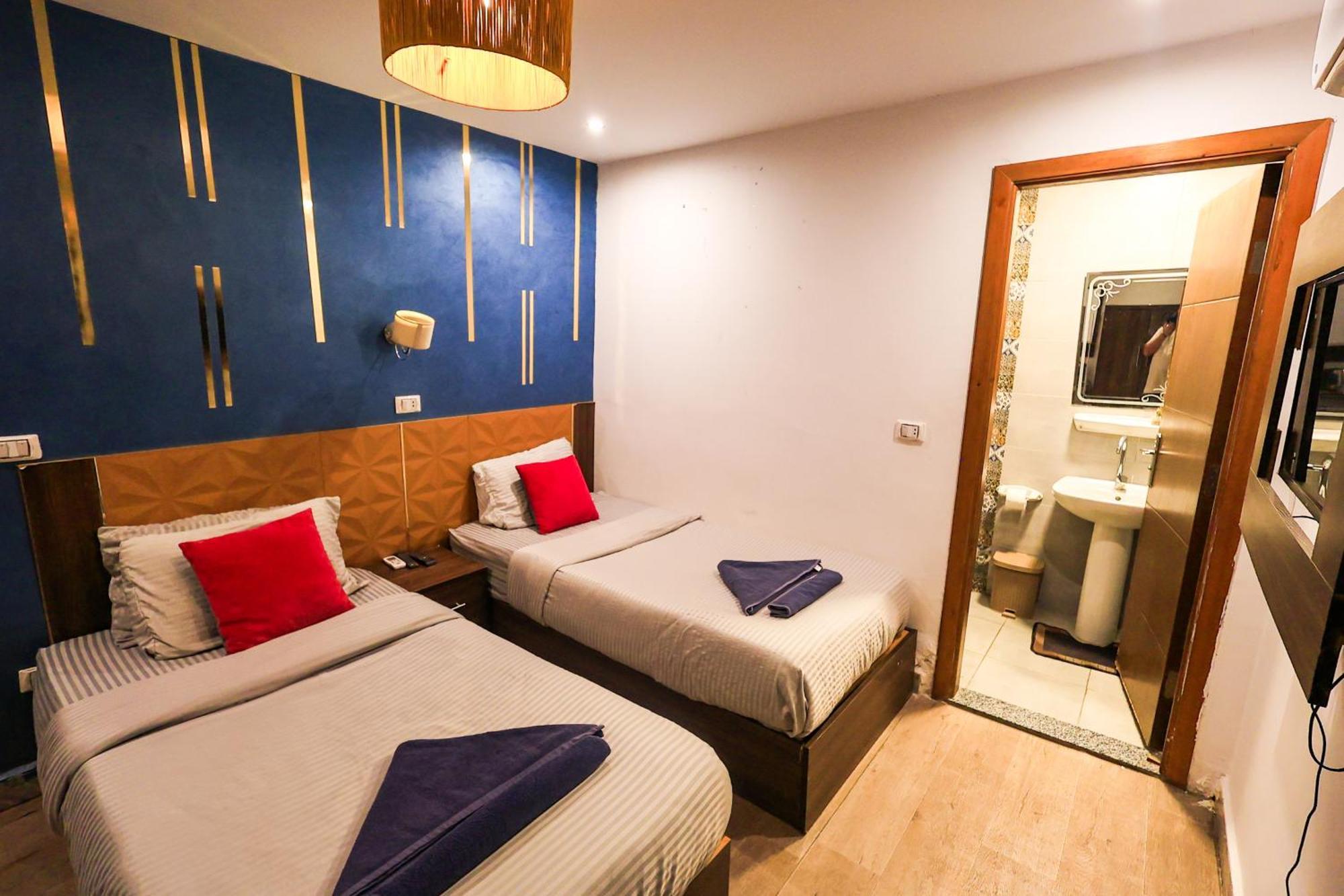 Grand Pyramids Inn Kafret el-Gabal Esterno foto