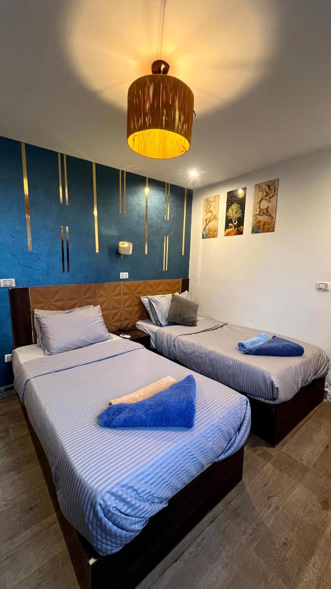 Grand Pyramids Inn Kafret el-Gabal Esterno foto
