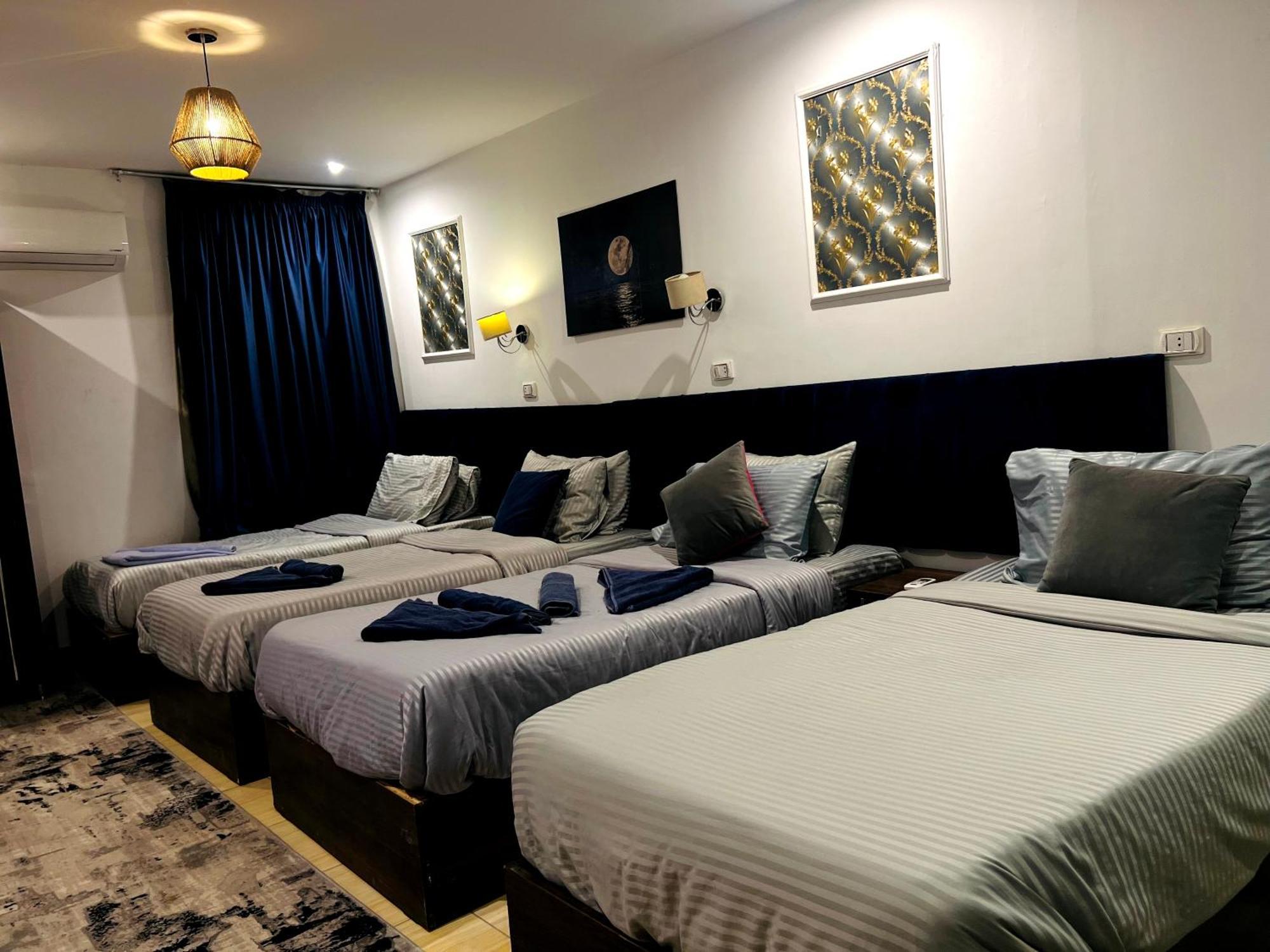 Grand Pyramids Inn Kafret el-Gabal Esterno foto