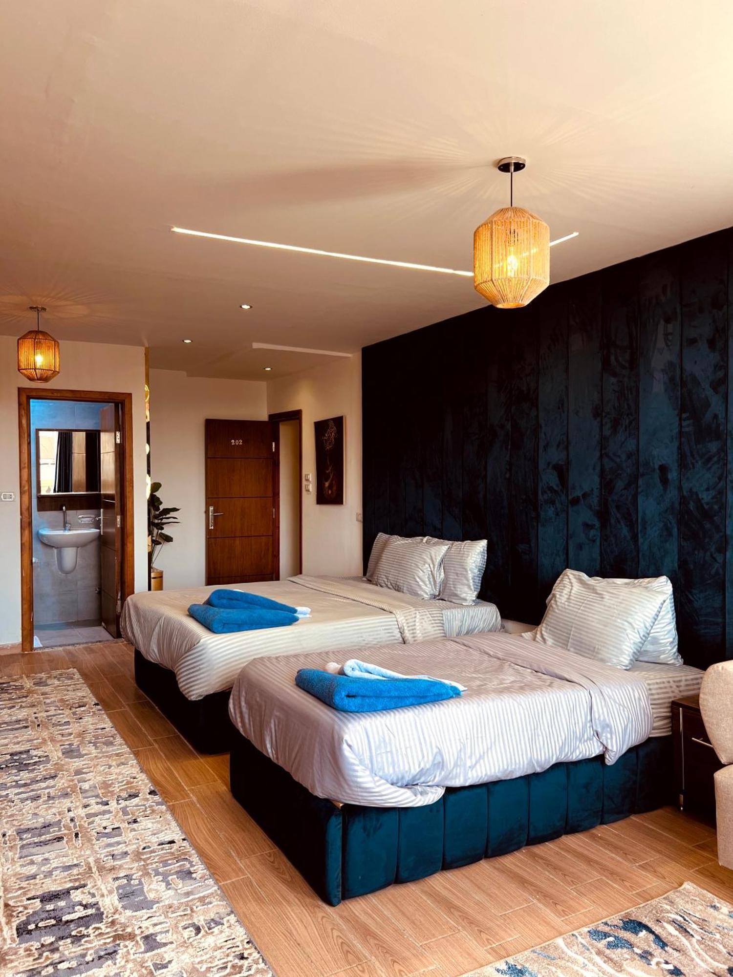 Grand Pyramids Inn Kafret el-Gabal Esterno foto