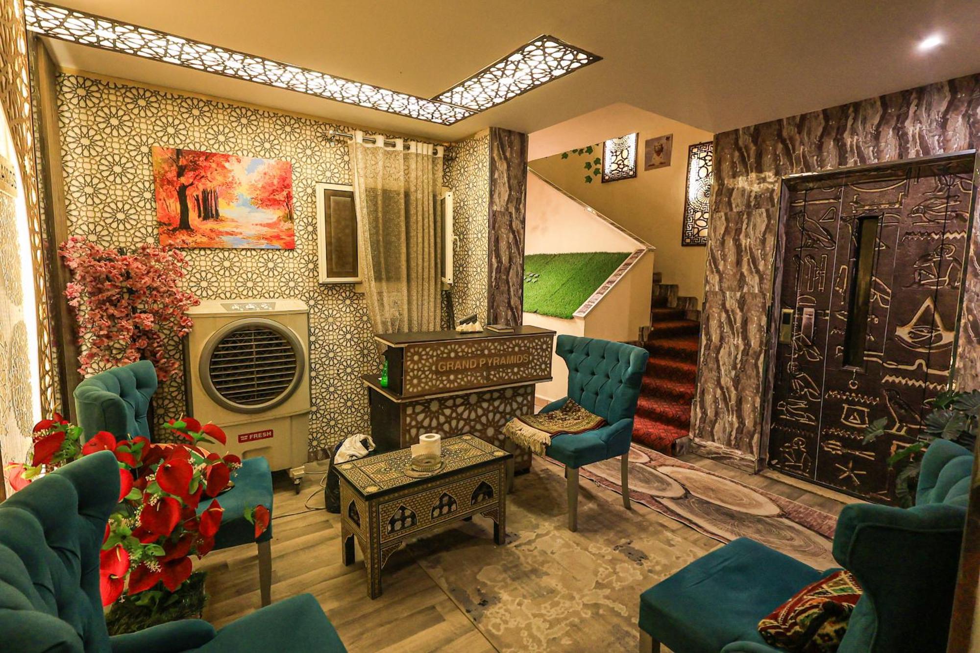Grand Pyramids Inn Kafret el-Gabal Esterno foto