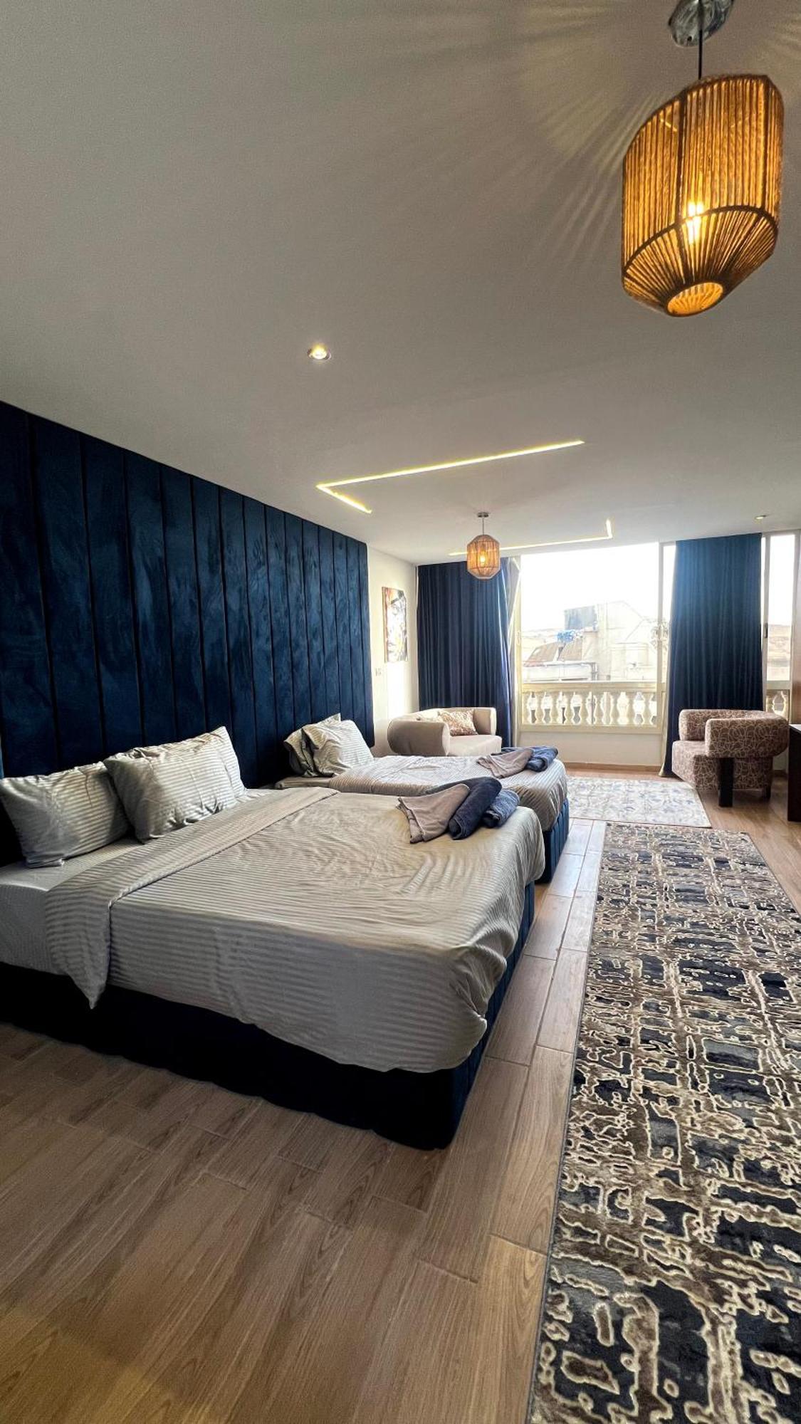 Grand Pyramids Inn Kafret el-Gabal Esterno foto